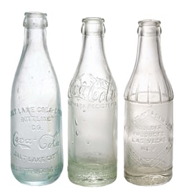 COLLECTION OF 3 COCA-COLA STRAIGHT-SIDED GLASS BOTTLES