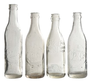 COLLECTION OF 4 PEPSI-COLA EMBOSSED GLASS BOTTLES