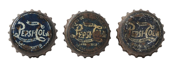 COLLECTION OF 3 PEPSI-COLA BOTTLE CAPS