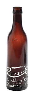 PEPSI-COLA TARBORO, NC GLASS BOTTLE: Amber Tarboro, North Carolina large script. CONDITION: Case wear, fleabites, light scratches, and heel damage. Condition: (7.0). Dimensions: 2 - 1/4" Dia. x 8 - 3/4" T.