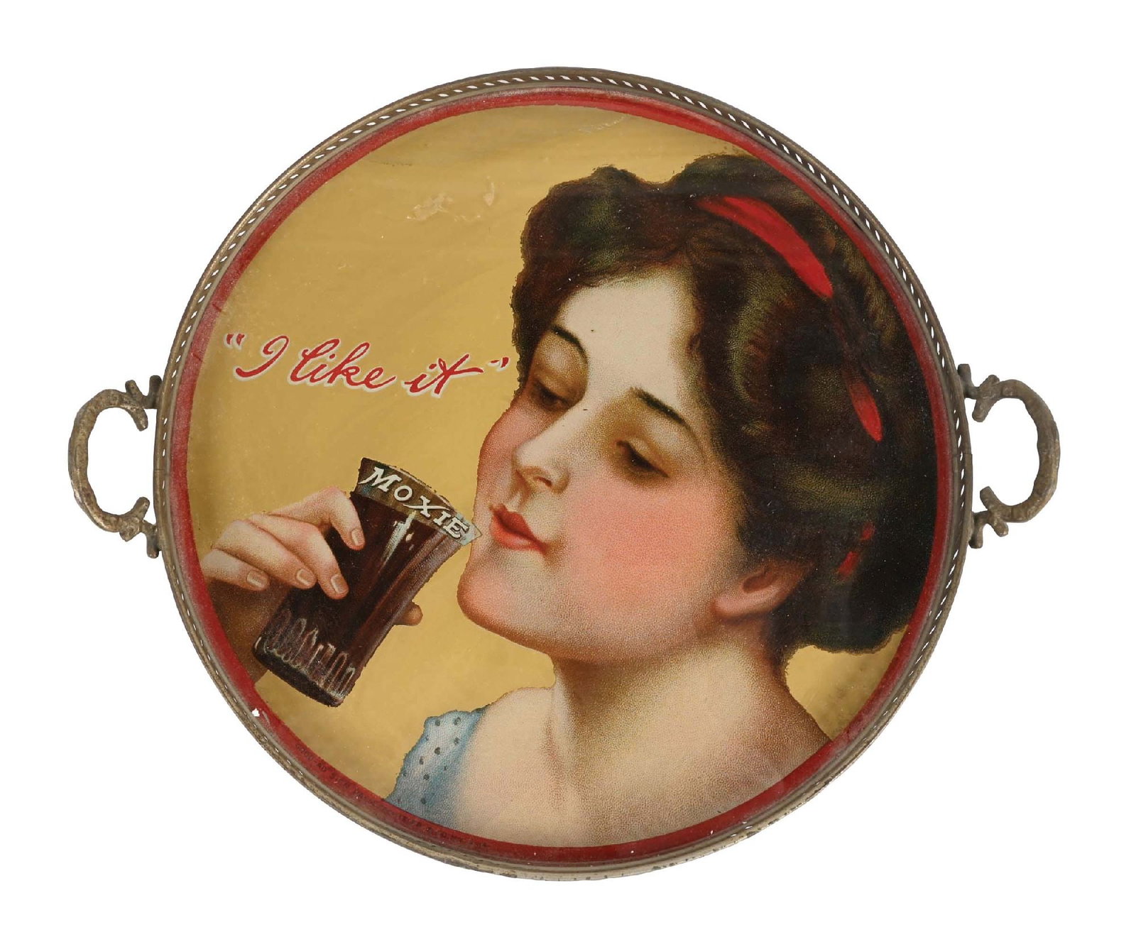MOXIE TRAY "I LIKE IT" W/ WOMAN GRAPHIC: This c. 1905 glass serving tray from Moxie features a beautiful woman graphic, with the tagline "I Like It". CONDITION: The field shows a few specks of color loss in the woman's upper face, as well as