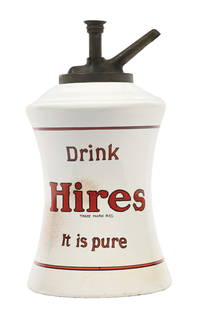 HIRES ROOT BEER SYRUP DISPENSER: This c. 1920s ceramic syrup dispenser from Hires Root Beer features the iconic company logo and "It is Pure" tagline. CONDITION: The body of the dispenser shows areas of darkened crazing. The mouth