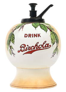 DRINK BIRCHOLA SYRUP DISPENSER: A nice example of this c. 1910s-1920s ceramic syrup dispenser from Birchola with syrup pump. CONDITION: The body of this dispenser shows some brown staining to the white ceramic material. There is