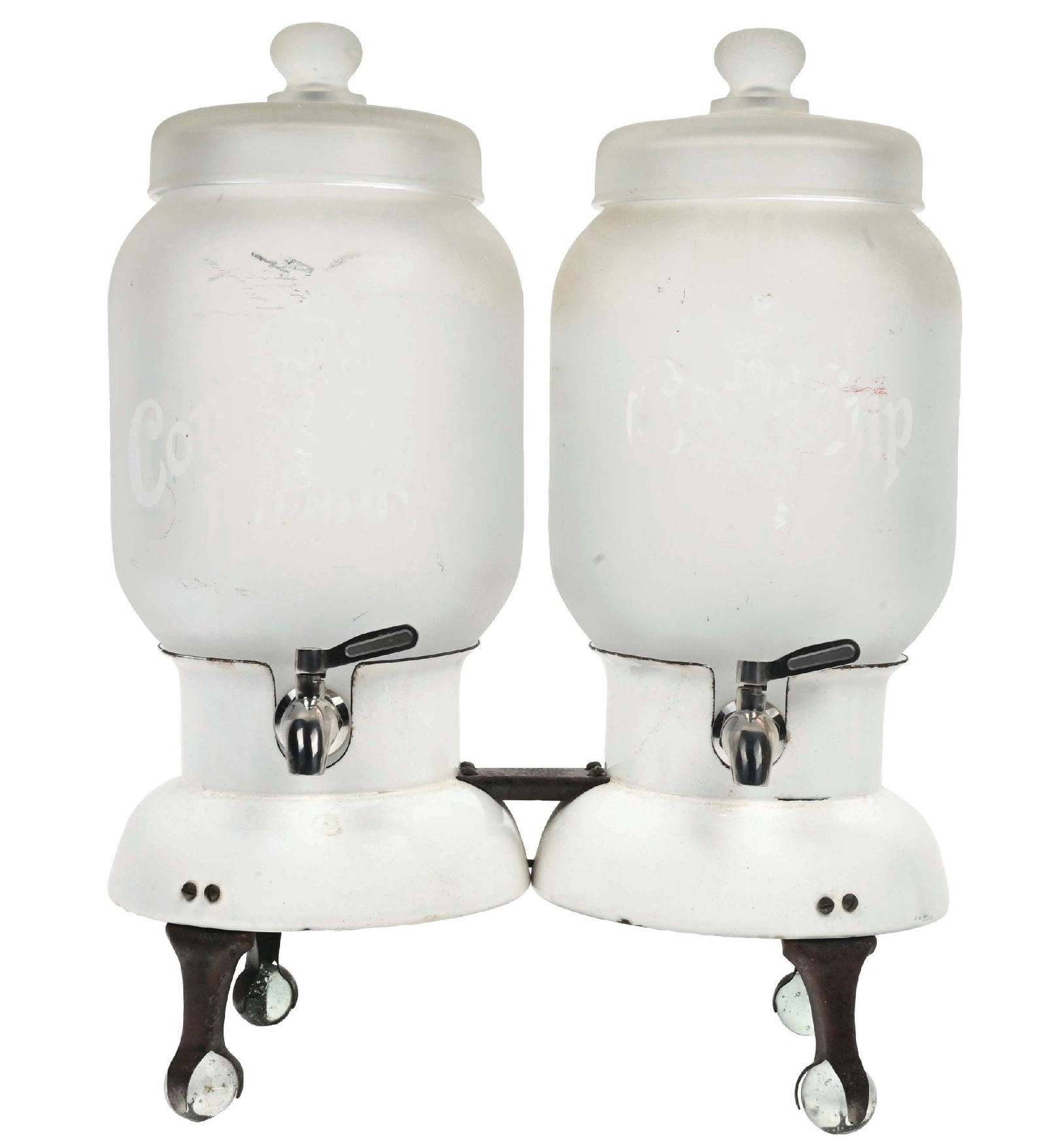 CHERRY TIP AND CONCORD PUNCH SODA DISPENSER: This c. 1920 dispenser from Cherry Tip and Concord Punch features a nice porcelain base with the company name, and two frosted glass jars as well. CONDITION: The porcelain base shows a few small spots