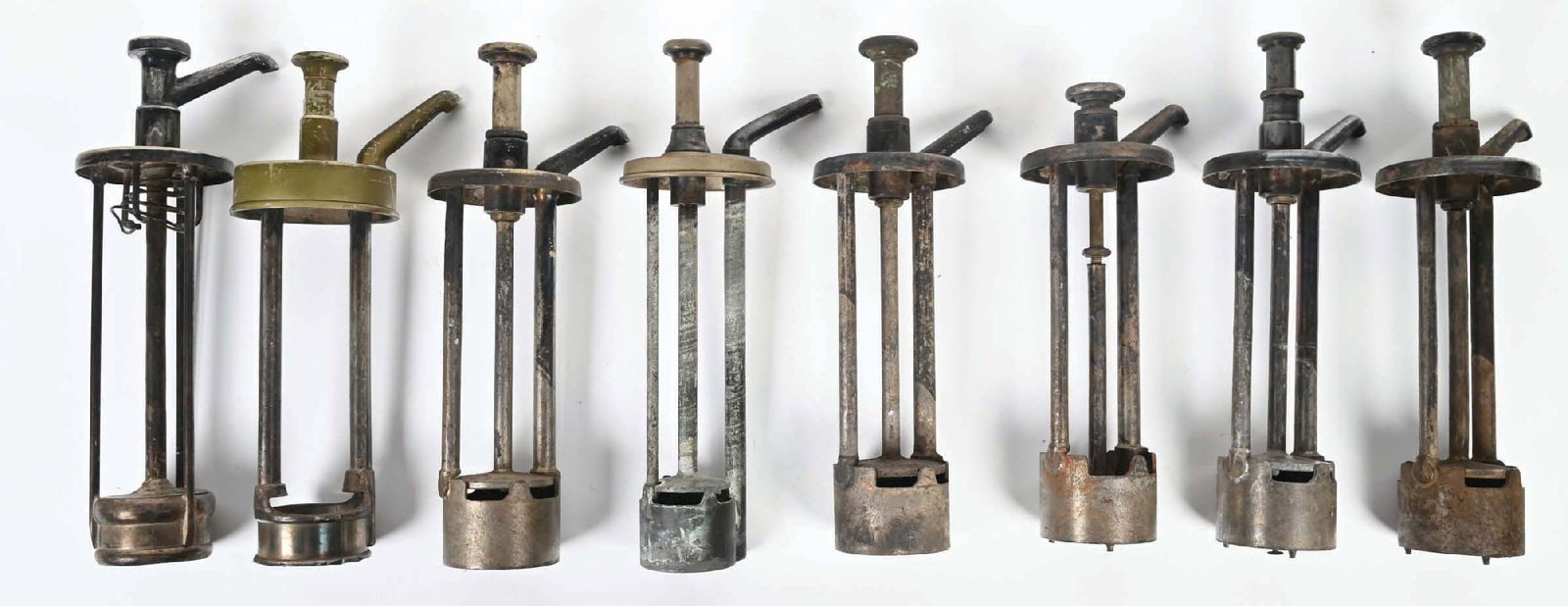 COLLECTION OF 8 SYRUP DISPENSER PUMPS: CONDITION: The syrup dispenser pumps are in various conditions. They show areas of oxidation and plating loss. Some are operational, some are not. Condition: (Good). Dimensions: Largest: 3" D . x 14" 