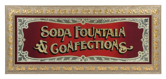 SODA FOUNTAIN & CONFECTIONS GLASS SIGN: A stunning example of this reverse painted and foil-under-glass sign reading "Soda Fountain & Confections." CONDITION: The field remains clean and the glass is undamaged. The foil lettering shows nice
