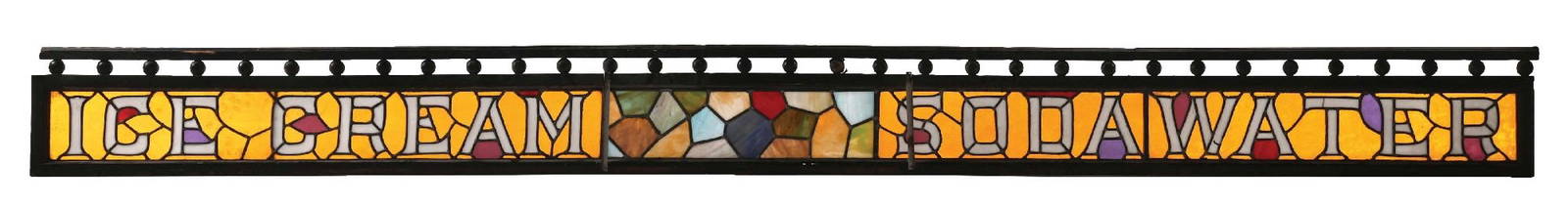 ICE CREAM PARLOR STAINED GLASS WINDOW: C. 1920. CONDITION: Showing several hairline cracks in the original glass, some areas of loose solder, but overall with a great early look. This is not a standard shippable item and will require 3rd p