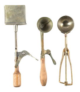 COLLECTION OF 3 EARLY ICE CREAM SCOOPS: This collection of three c. 1910s ice cream scoops are all complete and have a great eye appeal. CONDITION: All three show a light patina to the metal finish. They all operate as intended. A nice