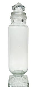 25" TALL ATHENIAN SAMPLE BOTTLE CANDY JAR: C. 1910. CONDITION: It shows no chips or cracks to the main glass receptacle. There are no chips to the inside or outside lip of the top of the jar or the lip of the ground stopper. The ground stopper