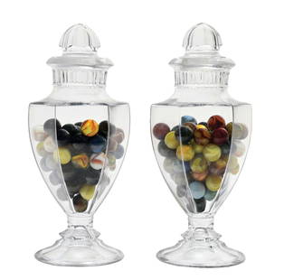 PAIR OF 11-3/4" PURITAN CANDY JARS W/ GROUND STOPPERS: C. 1900. CONDITION: There are no chips or cracks to the main receptacles. There are no chips or fleabites to the inside or outside rim of both the candy jar and ground stopper. Condition: