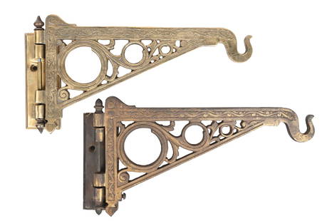 PAIR OF CAST IRON WALL BRACKETS FOR SODA FOUNTAIN & PHARMACY SHOW GLOBES: C. 1900. CONDITION: (A) A cast iron in bronze, showing oxidation and surface rust throughout. It is complete and operational. (B) A cast iron in bronze, showing light oxidation. It shows an original