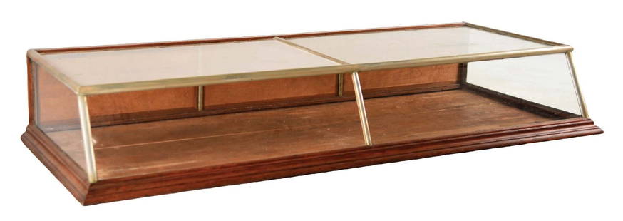 LARGE COUNTERTOP GLASS & WOOD STORE DISPLAY SHOWCASE: Countertop display case with all-original glass and back doors. This is not a standard shippable item and will require 3rd party shipping or pickup arrangements to be made. Condition: (Very Good). Dim