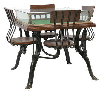 ORIGINAL SODA FOUNTAIN SHOWCASE TOPPED TABLE W/ SWING-OUT CHAIRS: C. 1915. CONDITION: A rare version of this showcase topped soda fountain table. Walnut construction with a glass top and all original hardware corners. It has a swing-out cast iron base with swing-out
