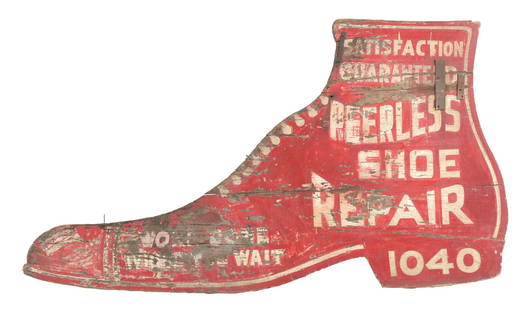 PEERLESS SHOE REPAIR WOOD TRADE SIGN: This c. 1910s-1920s double-sided wood trade sign in the form of a shoe from Peerless Shoe Repair features a wonderful patina, with hand-painted lettering. A period repair was done with metal braces an