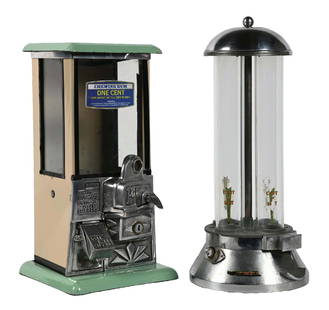 COLLECTION OF 2 1¢ GUM VENDING MACHINES: A nice collection of two gum vending machines. CONDITION: (A) The "glass tube" vendor remains clean, with only some light surface oxidation to the metal finish. The glass tubes are undamaged (8.5). (B