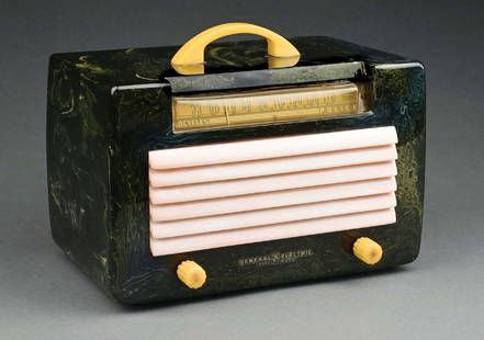 GENERAL ELECTRIC MODEL L570 CATALIN RADIO IN GREEN AND YELLOW: C. 1941. General Electric Co. Bridgeport CT. CONDITION: Showing good color to the body with faded front grill, factory knobs and handle. Back panel is present as is the cord, with scuffs at the back e