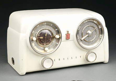 WHITE CROSLEY "DASHBOARD" BAKELITE RADIO MODEL D-25: C. 1950. CONDITION: Showing no cracks or repairs, light scuffs from use and age. Dials are original, with back panel and no cord. Overall moderate wear. Set is being sold as a "non-working" vintage el