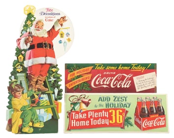 COLLECTION OF 3 CHRISTMAS COCA-COLA SANTA AND PAPER SIGNS