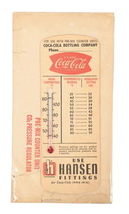 SMALL COCA-COLA CARDBOARD THERMOMETER: This c. 1960s cardboard thermometer with original envelope features the script logo and fishtail design. CONDITION: The thermometer shows light yellowing to the field. The envelope is intact and