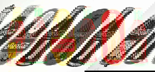 COLLECTION OF 6 COCA-COLA TIN THERMOMETERS: A nice collection of six tin thermometer signs from Coca-Cola. The gold double thermometer is a reproduction, but all the others are original. CONDITION: These thermometers shows areas of darkening to