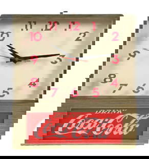COCA-COLA LIGHT-UP CLOCK: This c. 1960s light-up clock from Coca-Cola features the iconic script logo, with a nice gold colored outer body. CONDITION: The numbers on the glass face show light fading to the red color. The scrip
