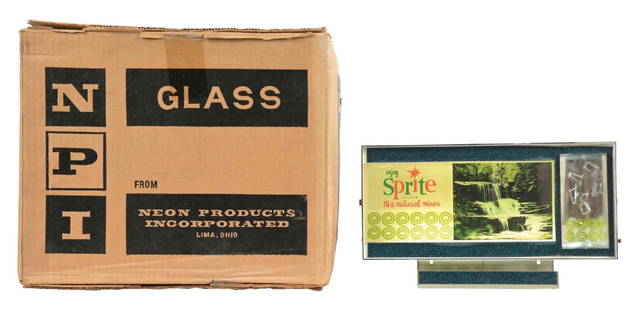 NOS "ENJOY SPRITE" LIGHT-UP COUNTERTOP SIGN: Maker marked "Neon Products Incorporated." A NOS example of this c. 1960s light-up countertop sign from Sprite, featuring the iconic logo with a wonderful waterfall motion display. CONDITION: This sig