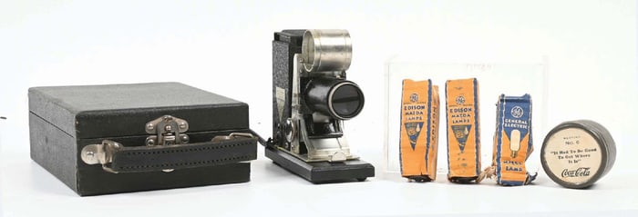 COCA-COLA FILM ROLL WITH PROJECTOR AND MAZDA BULBS