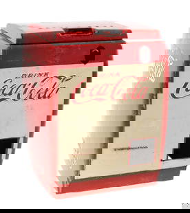 COCA-COLA ELECTRIC-COOLED COOLER: This is a Coca-Cola electric-cooled cooler. Marked "Property of the Coca-Coca Bottling Works Company." Also marked with "Item 3579". CONDITION: Lift-top lid in old original paint, great candidate for