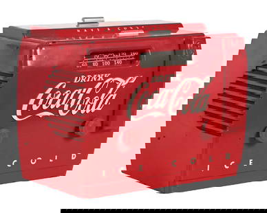 COCA-COLA COOLER RADIO: This c. 1950s cooler radio from Coca-Cola features the script logo nicely embossed on the front, with the original heavy cardboard backing and factory power cord. CONDITION: The body of the radio show