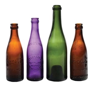 COLLECTION OF 4 GLASS BOTTLES