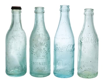 COLLECTION OF 4 STRAIGHT-SIDED GLASS BOTTLES
