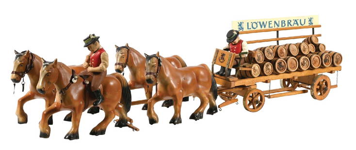 LOWENBRAU HORSE-DRAWN BEER BARREL WAGON DISPLAY: A nice figural display from Lowenbrau Beer featuring a horse pulled wagon, with barrels of beer and two beer-fest dressed drivers. CONDITION: The display remains clean with only a few areas of wear an