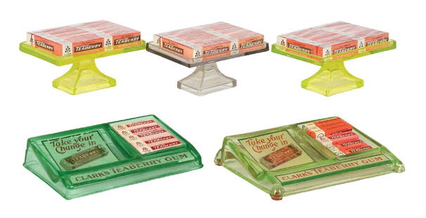 COLLECTION OF 5 CLARK'S TEABERRY GLASS GUM DISPLAYS: A nice collection of give glass chewing gum display stands, with original Teaberry packaging for enhanced display. CONDITION: The glass stands remain clean and undamaged. A few of the logoed areas und