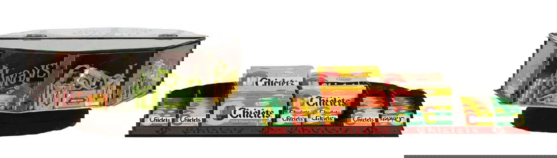 COLLECTION OF 2 GLASS GUM DISPLAY CASE AND COUNTER DISPLAY STAND: A nice collection of two chewing gum displays, including a rotating display and a Chiclets countertop display. CONDITION: (A) The rotating glass display remains clean, with no damage to the glass. The