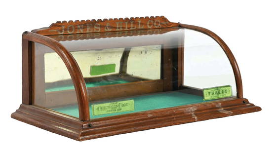 JONES & HILL CO OAK CHEWING GUM DISPLAY CASE: A nice small-sized showcase from Jones & Hill Chewing Gum Company. CONDITION: The glass remains undamaged, with a few bubbles and scuffs to the surface. The wood is clean with a nice aged patina. Cond