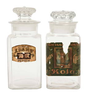 PAIR OF CHEWING GUM DISPLAY JARS: (A) Adams' Pepsin Gum jar with correct ground lid, no noticeable chips or cracks, with 90% original front decal. (B) Richardson's Pepsin Kola Gum display jar with original front label, ground stopper,