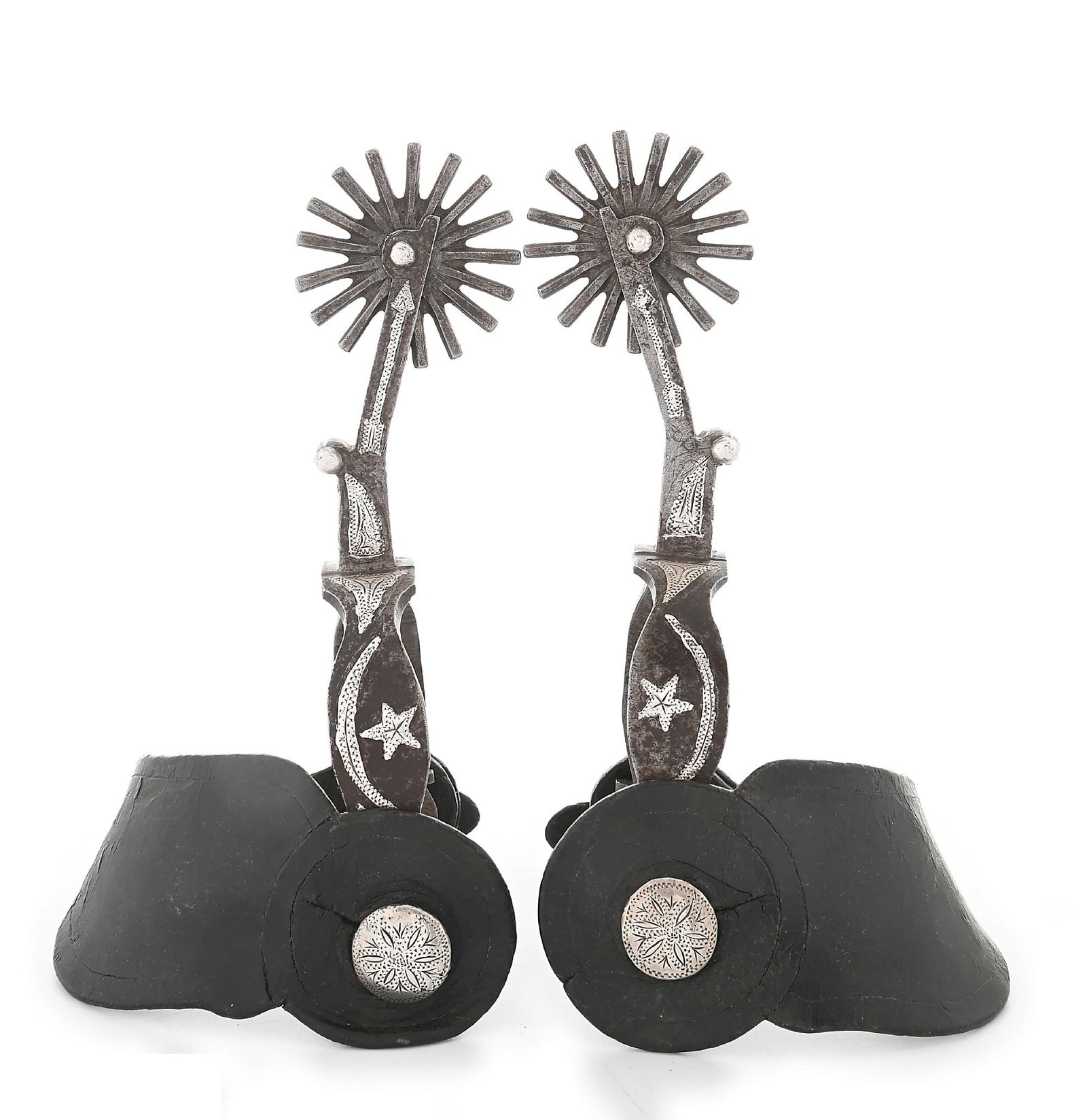 RANCH-MADE SHOW SPURS: Silver overlaid swelled 1 " bands with crude engraving and extra long 3 1/2" shanks holding a 2 1/2" rowel. The off side are inlaid with arrows, stars and crescents. Impressive vintage bunk house spur