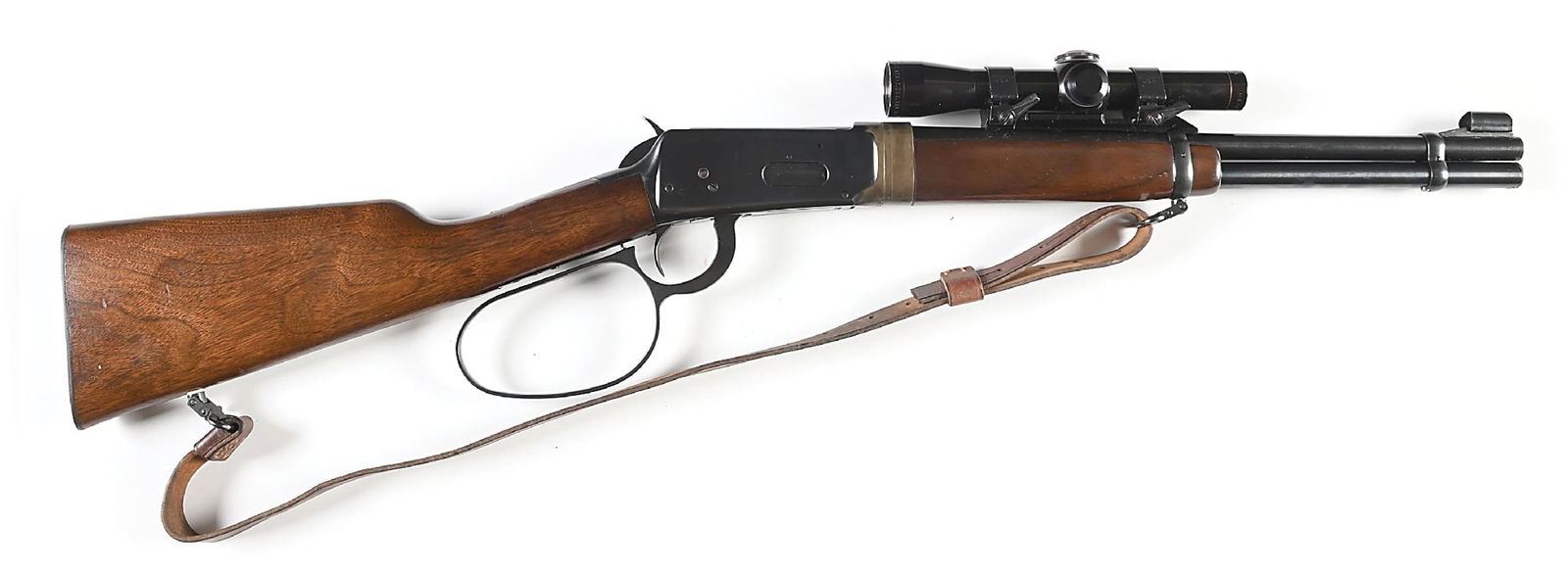 (C) CUSTOM PRE 64 WINCHESTER MODEL 94 TAKE DOWN TRAPPER LEVER ACTION SADDLE RING CARBINE.: Frame built in 1961. Custom built takedown with short barrel, hooded ramp front sight,a barrel-mounted Leupold scope, saddle ring, large loop John Wayne lever, walnut stocks, short forearm, checkered