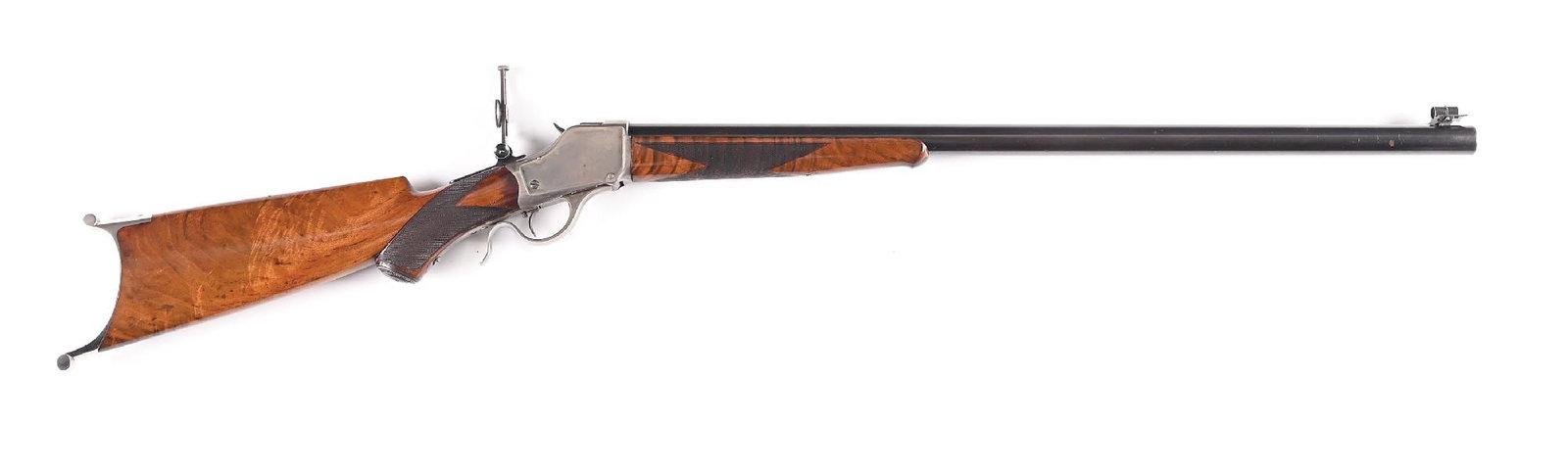 (A) A.W. PETERSON DELUXE WINCHESTER MODEL 1885 HIGH WALL SINGLE SHOT RIFLE.: This high wall originally shipped November 28, 1887 as a special order deluxe rifle. Rifle was subsequently modified by Axel Peterson, as marked "A.W. PETERSON - DENVER, COLO." on the barrel. Peterson