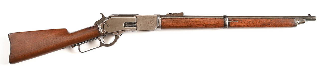 (A) SCARCE NORTH WEST MOUNTED POLICE ISSUED WINCHESTER MODEL 1876 LEVER ACTION CARBINE.: This carbine was one in a shipment of 50 carbines sent to the Northwest Mounted Police and shipped on April 23, 1884, order number 11518. The accompanying Winchester letter confirms this order number