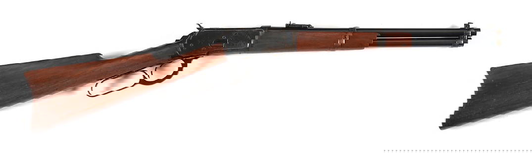 (C) FINE 15" WINCHESTER MODEL 1892 SADDLE RING TRAPPER CARBINE IN .38 WCF.: Circa 1917. This carbine features a highly desirable special order 15" blued barrel with full length magazine tube retained by a pair of barrel bands. Pinned white bead blade front sight and ladder re
