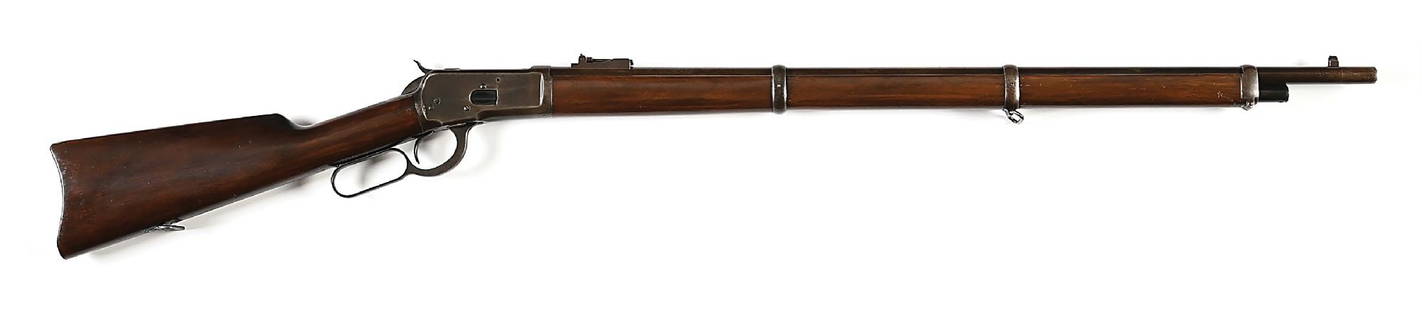 (C) RARE WINCHESTER MODEL 1892 LEVER ACTION MUSKET.: Manufactured in 1908. Less than 1% of total production and majority of these were ordered between 1906 and 1913. It is standard in all respects with two barrel bands, sling swivels, post front sight,