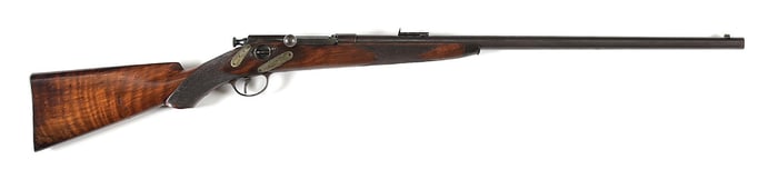 (A) RARE FIRST MODEL WINCHESTER MODEL 1879 HOTCHKISS DELUXE SPORTING RIFLE WITH WYOMING GRIZZLY