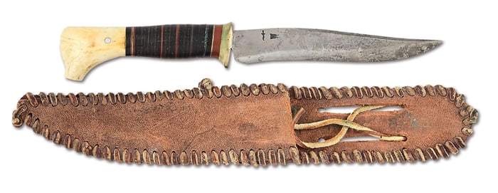 SCAGEL HUNTER IN A BRAIDED LEATHER SCABBARD.
