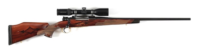 (C) WEATHERBY .300 WEATHERBY MAGNUM BOLT ACTION RIFLE WITH FACTORY ENGRAVED GOLD PLATED FLOORPLATE