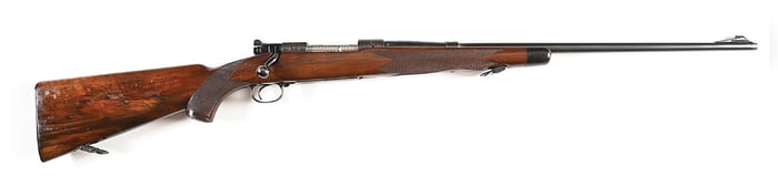 (C) DELUXE ENGRAVED PRESENTATION PRE-WAR MODEL 70 .220 SWIFT BOLT ACTION RIFLE.