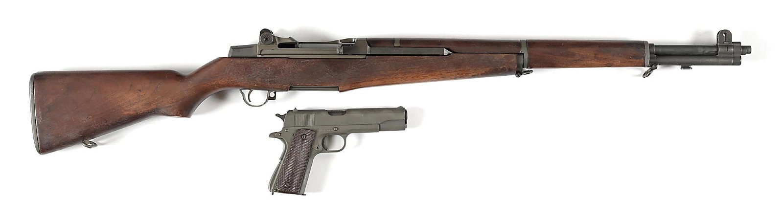 (C) PAIR OF UNION SWITCH & SIGNAL M1911A1 AND SPRINGFIELD M1 GARAND WITH MATCHING SERIAL NUMBERS.: Lot consists of 2 classic Word War II production small arms, the M1911A1 and M1 Garand, both sharing the same serial number, 1074028. Both were acquired from the Civilian Marksmanship Program in 2022 