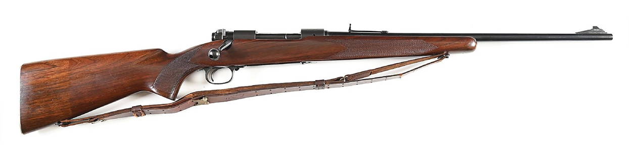 (C) SCARCE PRE-64 WINCHESTER MODEL 70 FEATHERWEIGHT BOLT ACTION RIFLE IN .358 WINCHESTER.: Manufactured circa 1958. The Featherweight was introduced in 1952. Rule writes that Winchester produced a total of 1848 Model 70s between 1955-57 in this caliber. Standard features include blue finish