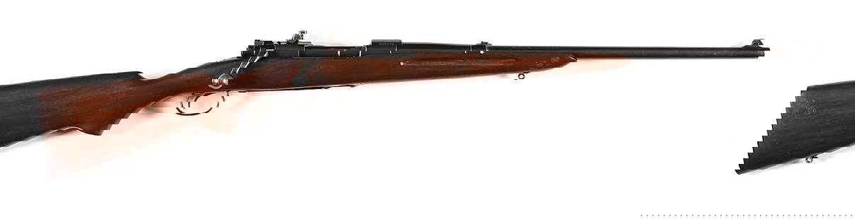 (C) RARE NON CATALOGUED WINCHESTER MODEL 54 BOLT ACTION CARBINE IN .38-55.: Receiver dates to 1930. Base of barrel is stamped "38-55", "VP" proof, "MNS" for Nickel Steel, and "28" for date. This indicates that the 1928 carbine barrel was assembled in 1930. Most of these delay