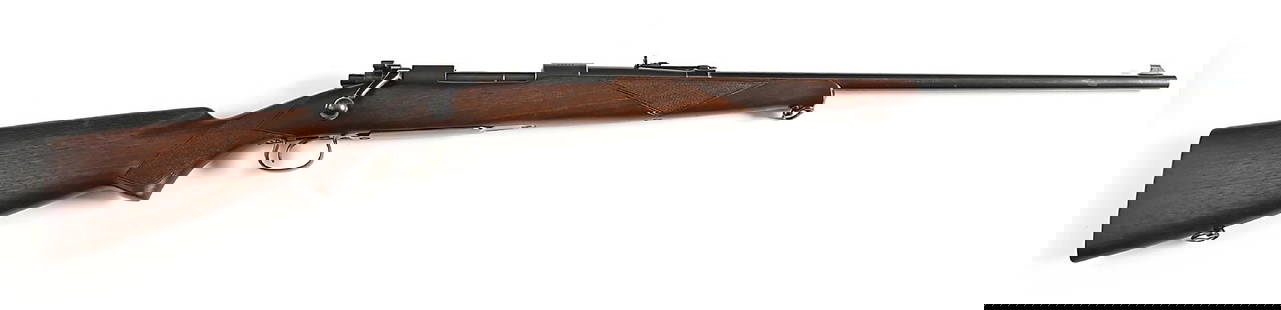 (C) RARE 7MM WINCHESTER MODEL 54 BOLT ACTION RIFLE.: Serial number indicates date of manufacture as 1928. Underside of barrel is stamped "MNS" for nickel steel, "VP" proof in brackets, "7 M/M", and "27" (date). Roger Rule's book lists the 7mm as fifth r